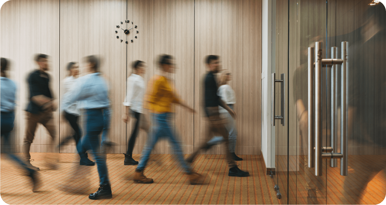 a group of people standing in a room