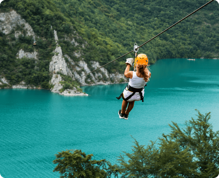 a man riding water skis on top of a mountain