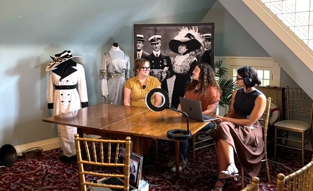 a group of people sitting at a table